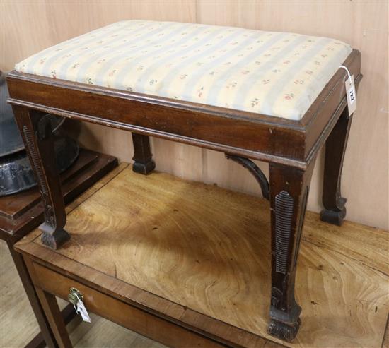 A carved mahogany dressing stool, with drop in seat W.63cm